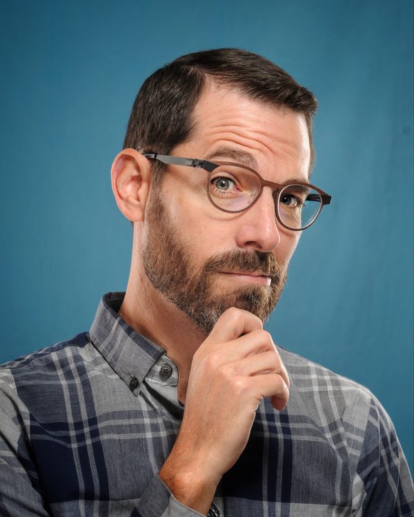 A patient of The Optical Centre in their glasses