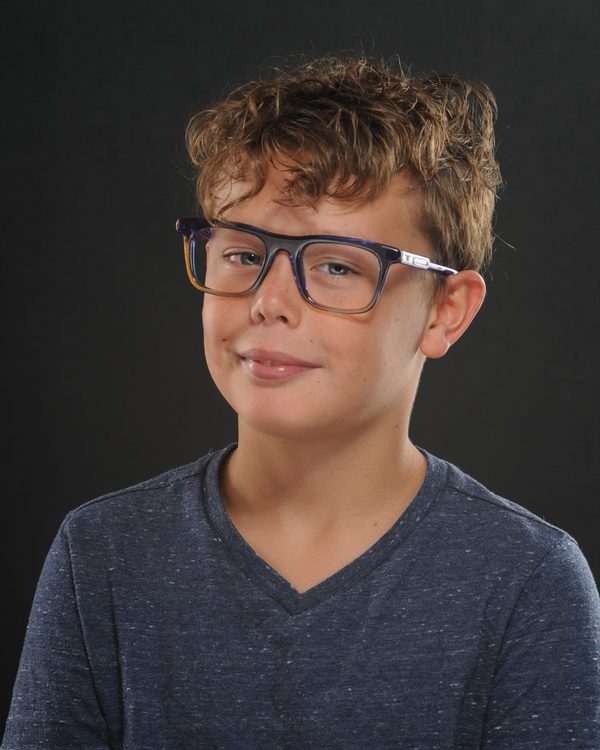 A patient of The Optical Centre in their glasses
