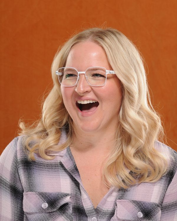 A patient of The Optical Centre in their glasses